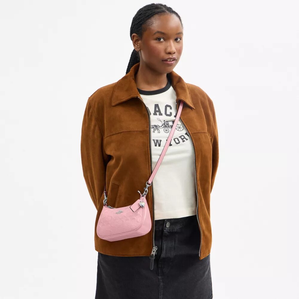 Bolso mini cruzado Teri en cuero exclusivo con diamante en forma de corazón