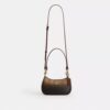 Bolso mini cruzado Teri en lona Signature Canvas
