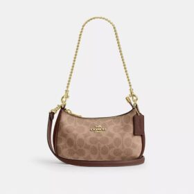 Bolso mini cruzado Teri en Signature Canvas