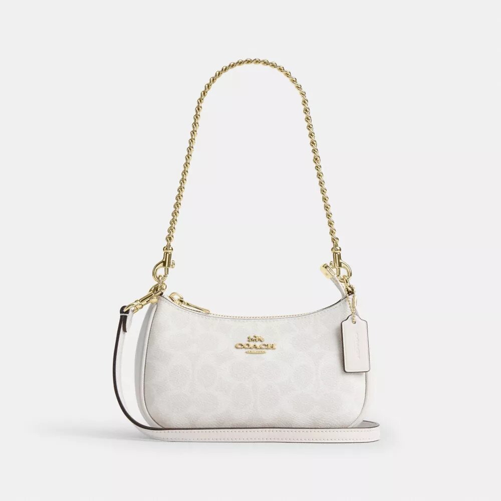 Bolso mini cruzado Teri en Signature Canvas