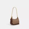Bolso mini cruzado Teri en Signature Canvas
