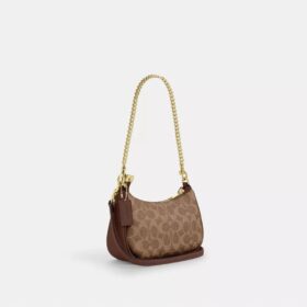 Bolso mini cruzado Teri en Signature Canvas