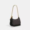 Bolso mini cruzado Teri en Signature Canvas