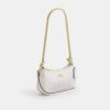 Bolso mini cruzado Teri en Signature Canvas