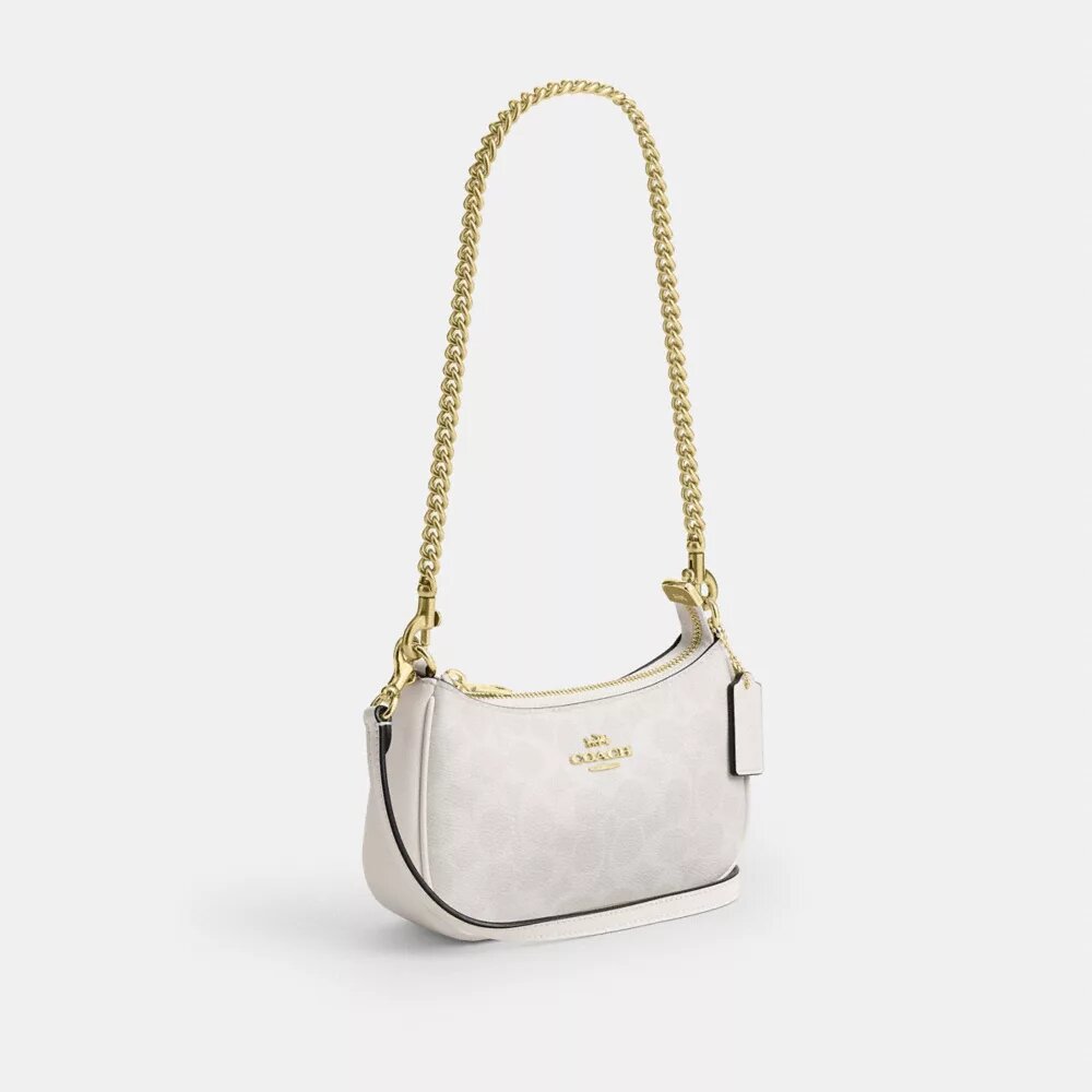 Bolso mini cruzado Teri en Signature Canvas