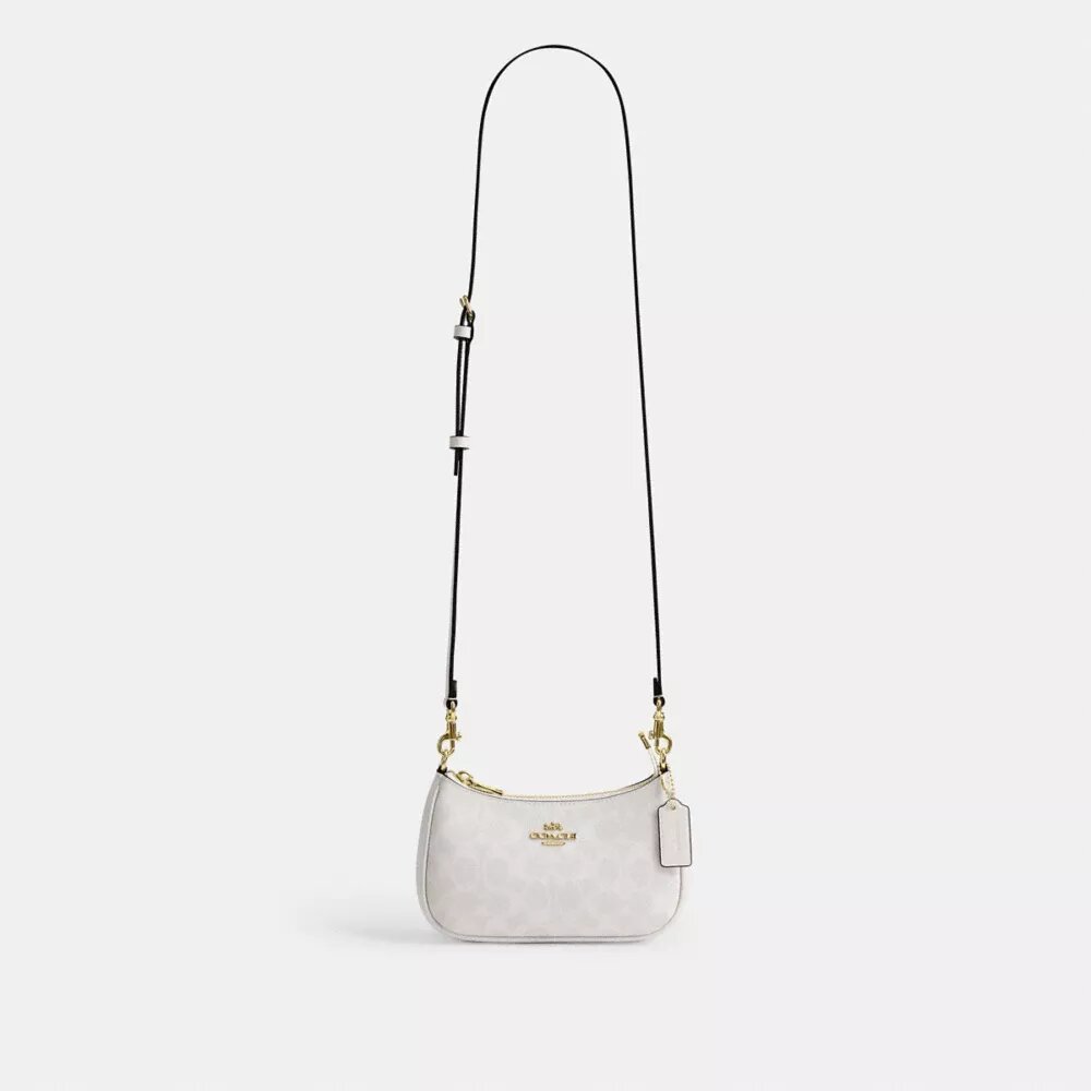 Bolso mini cruzado Teri en Signature Canvas