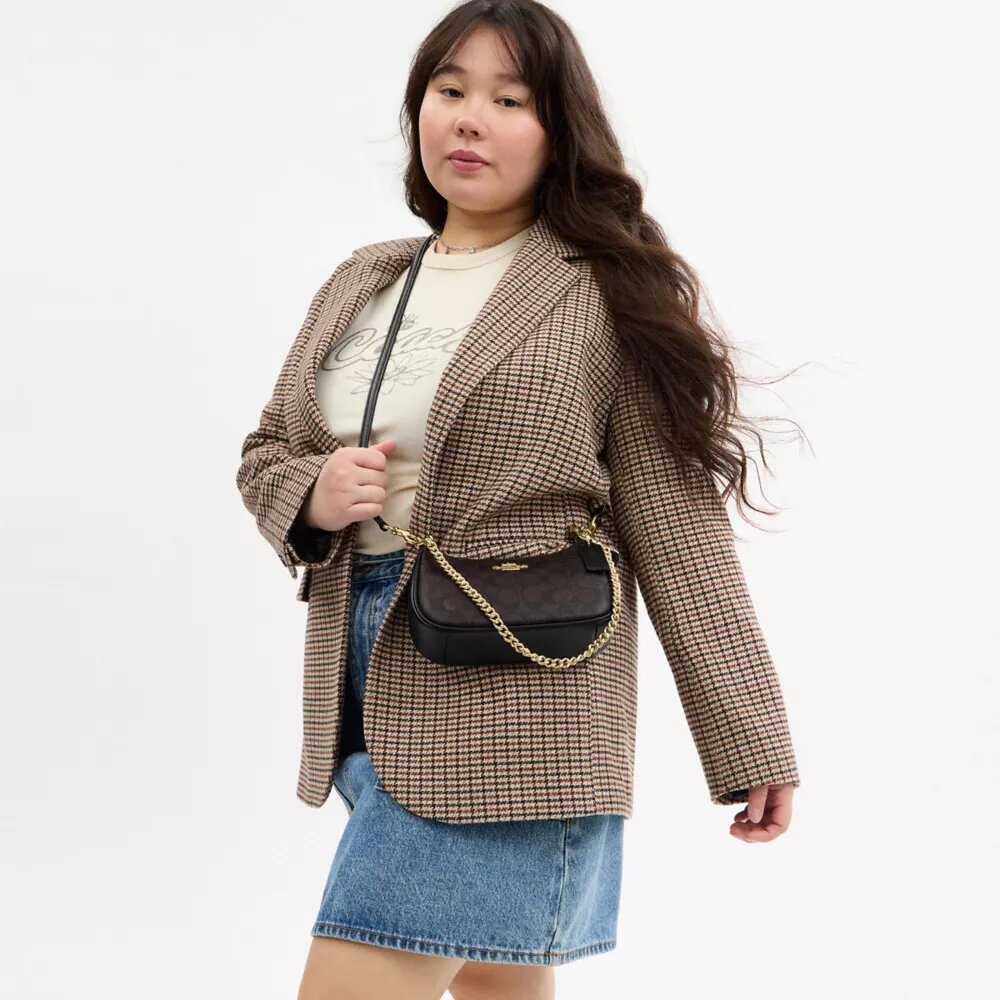 Bolso mini cruzado Teri en Signature Canvas