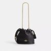 Bolso mini Faye con cordón y acolchado