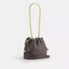 Bolso mini Faye con cordón y acolchado
