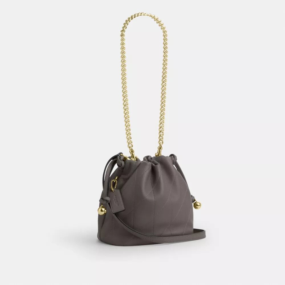 Bolso mini Faye con cordón y acolchado