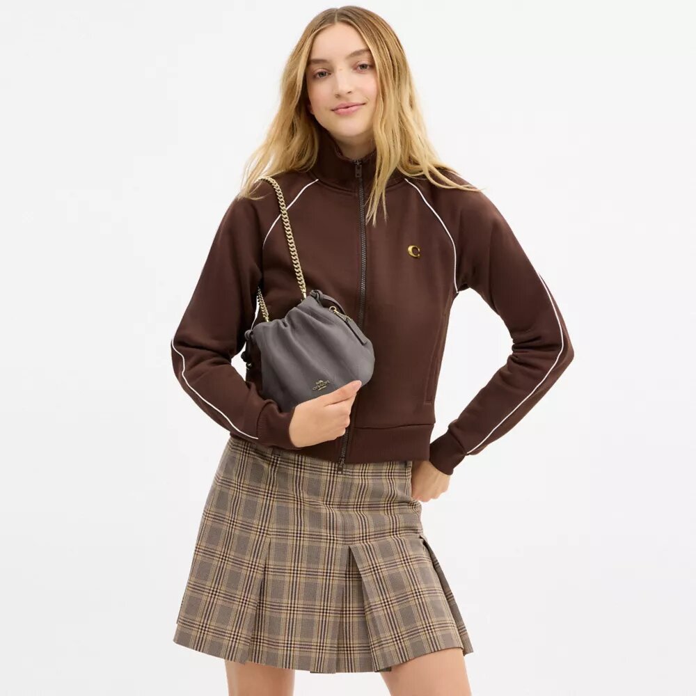 Bolso mini Faye con cordón y acolchado