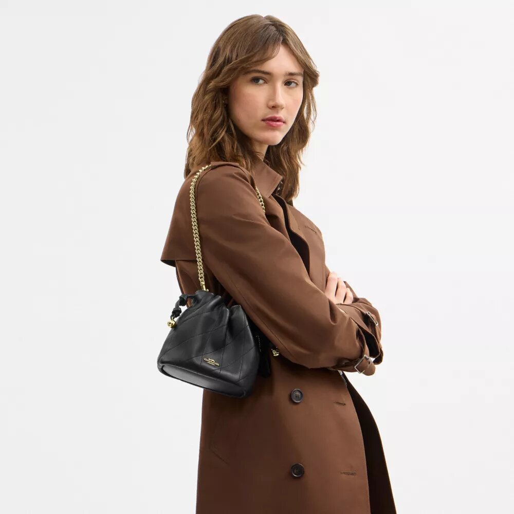 Bolso mini Faye con cordón y acolchado