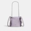 Bolso mini Faye con cordón y moños