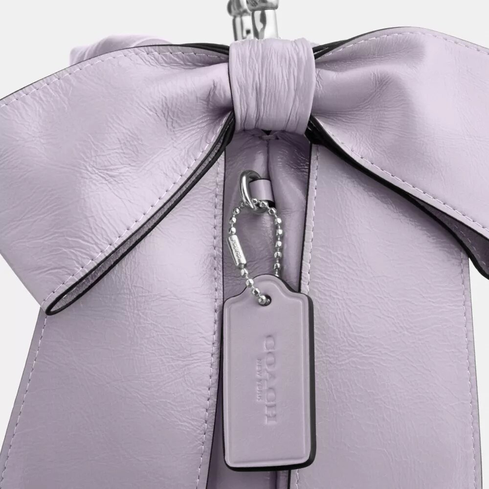 Bolso mini Faye con cordón y moños