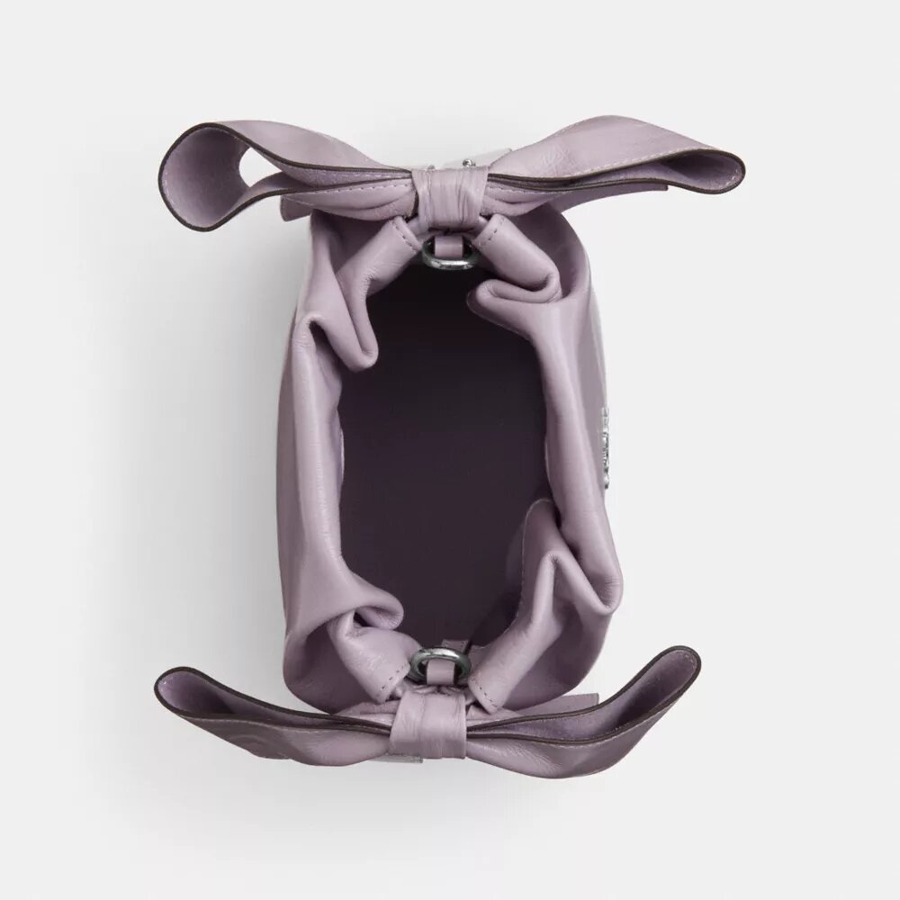 Bolso mini Faye con cordón y moños