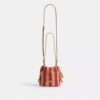 Bolso mini Faye con cordón y rayas