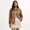 Bolso mini Faye con cordón y rayas