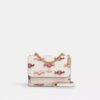 Bolso mini Klare de bandolera con estampado de dulces