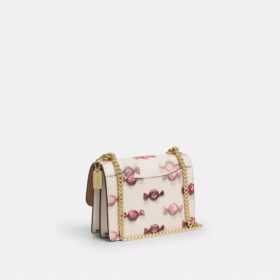 Bolso mini Klare de bandolera con estampado de dulces