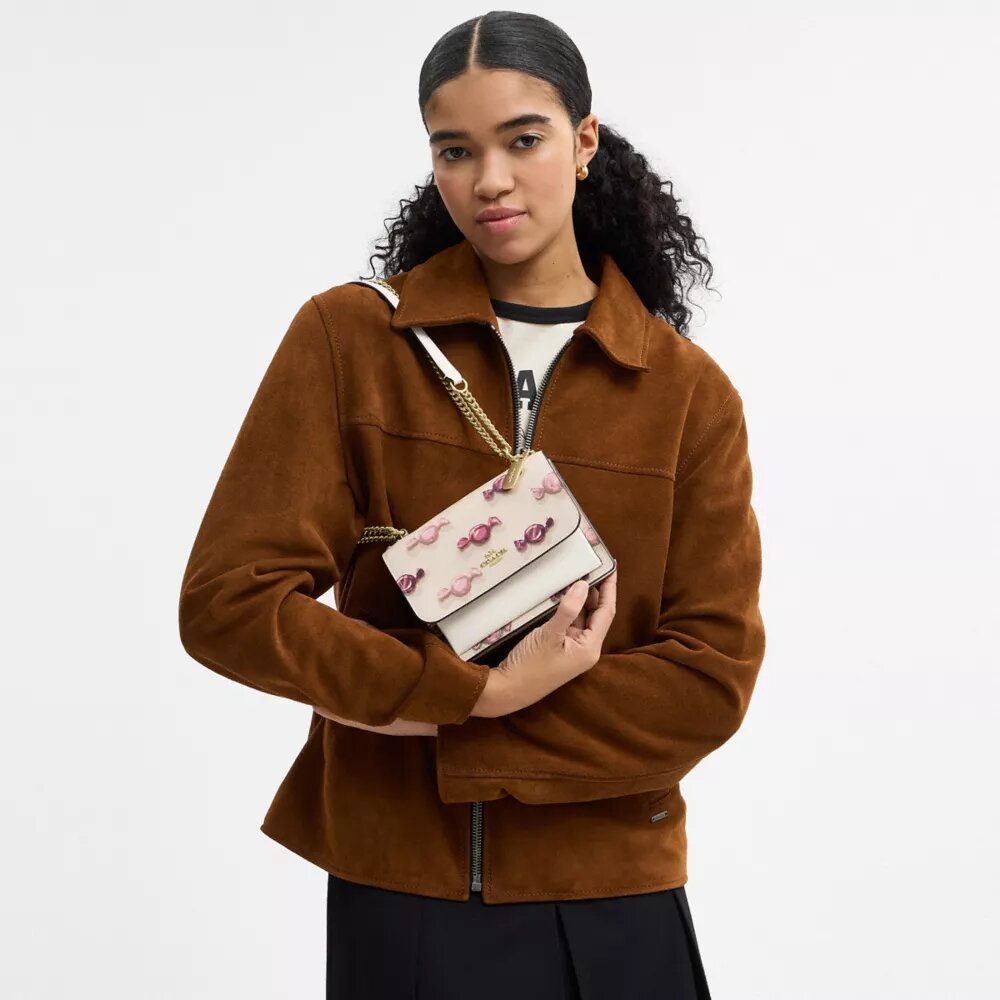 Bolso mini Klare de bandolera con estampado de dulces