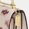 Bolso mini Klare de bandolera con estampado de dulces