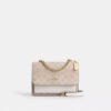 Bolso mini Klare de bandolera en Signature Canvas