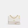 Bolso mini Klare de bandolera en Signature Canvas