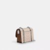 Bolso mini Klare de bandolera en Signature Canvas