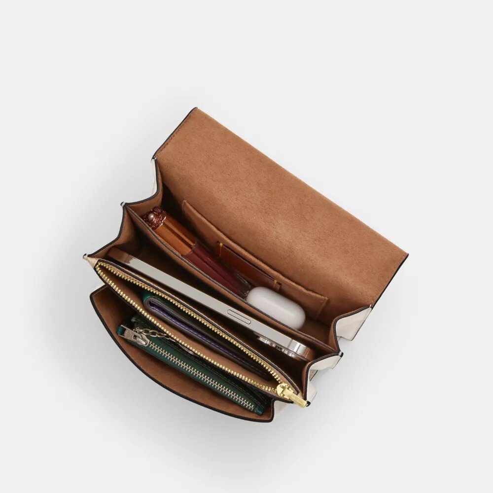 Bolso mini Klare de bandolera en Signature Canvas