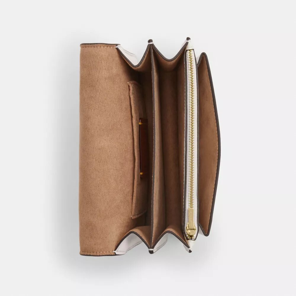 Bolso mini Klare de bandolera en Signature Canvas