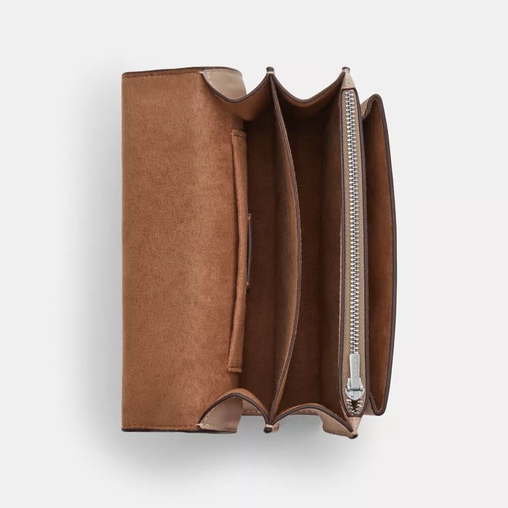 Bolso mini Klare de bandolera en Signature Canvas