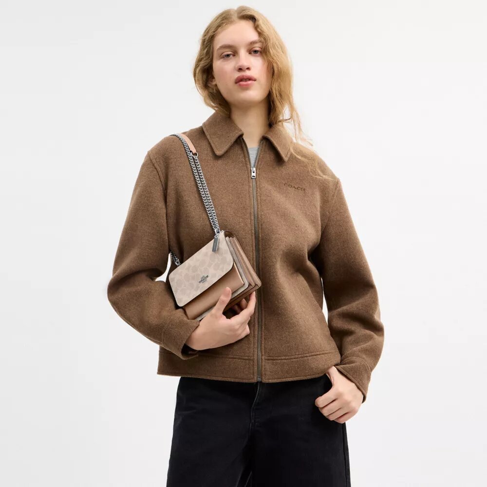 Bolso mini Klare de bandolera en Signature Canvas