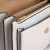 Bolso mini Klare de bandolera en Signature Canvas