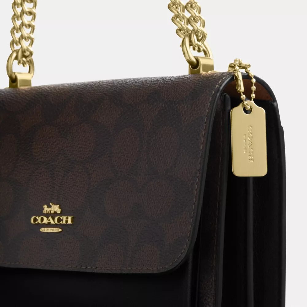 Bolso mini Klare de bandolera en Signature Canvas