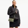 Bolso mini Rowan de bandolera en cuero exclusivo