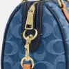 Bolso mini Rowan de bandolera en denim característico