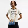 Bolso mini Rowan de bandolera en denim característico
