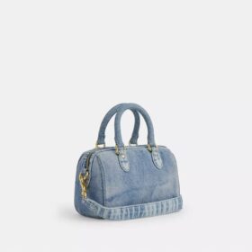 Bolso mini Rowan de bandolera en denim desgastado con Charms