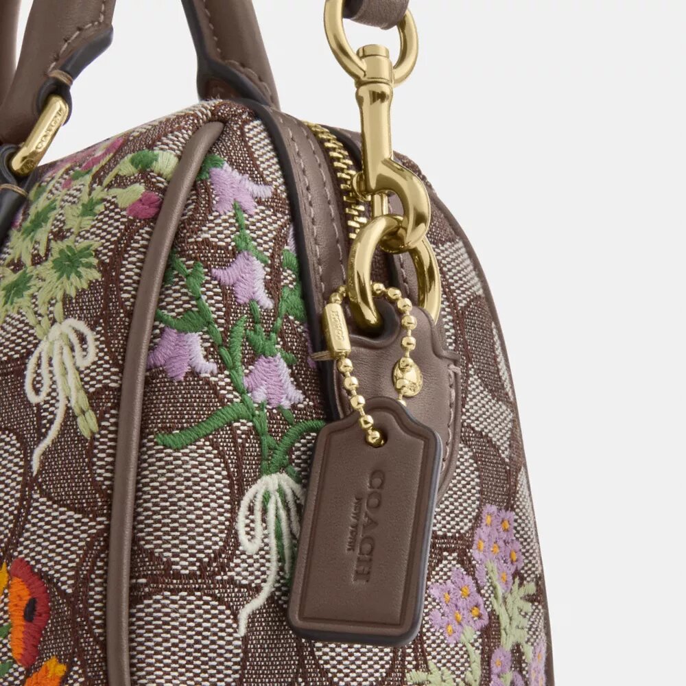 Bolso mini Rowan de bandolera en jacquard exclusivo con bordado floral