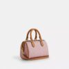 Bolso mini Rowan de bandolera en Signature Canvas con Charms
