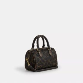 Bolso mini Rowan de bandolera en Signature Canvas con Charms