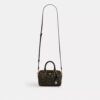 Bolso mini Rowan de bandolera en Signature Canvas con Charms