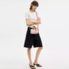 Bolso mini Rowan de bandolera en Signature Canvas con Charms