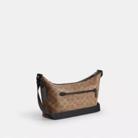 Bolso pequeño Finn de bandolera con bolsillo en Signature Canvas