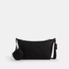 Bolso pequeño Finn para llevar cruzado con bolsita