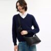 Bolso pequeño Finn para llevar cruzado con bolsita