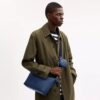 Bolso pequeño Finn para llevar cruzado con bolsita