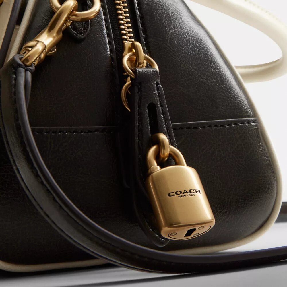 Bolso tipo «Bowling» con asa superior