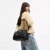 Bolso tipo cartera grande Rowan en cuero exclusivo