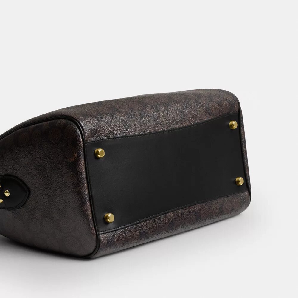Bolso tipo cartera grande Rowan en Signature Canvas